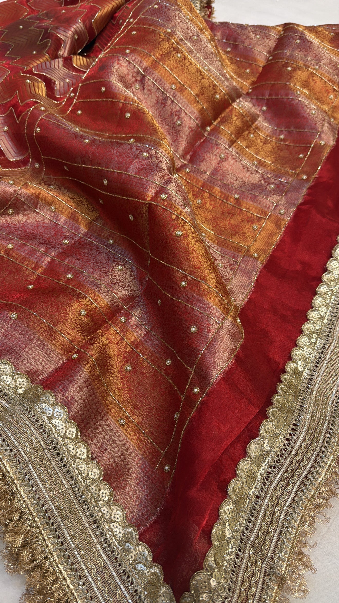 Tomato red husn tissue silk hand embroidered kadhwa saree